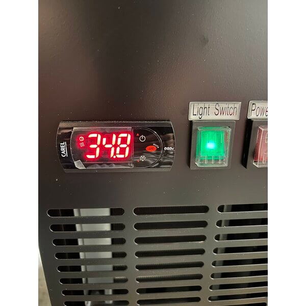 Scratch and Dent Avantco UDD-4-HC Black Kegerator / Beer Dispenser with (2) 2 Tap Towers - (3) 1/2 Keg Capacity