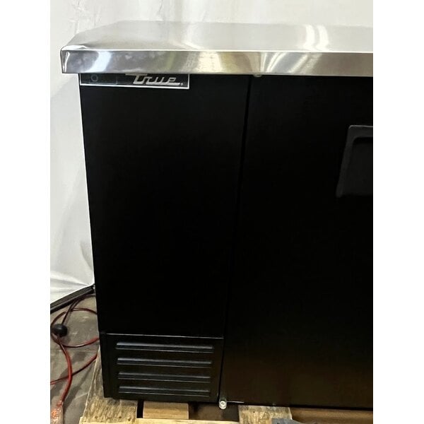Scratch and Dent True TBB-4-HC 90 3/8" Black Counter Height Solid Door Back Bar Refrigerator with LED Lighting