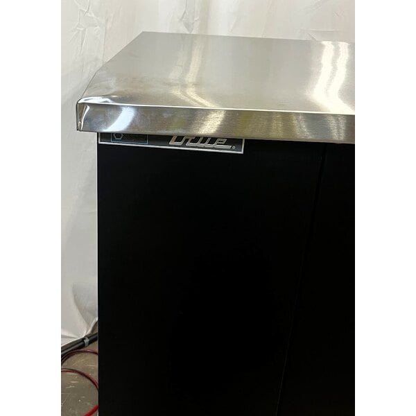 Scratch and Dent True TBB-4-HC 90 3/8" Black Counter Height Solid Door Back Bar Refrigerator with LED Lighting