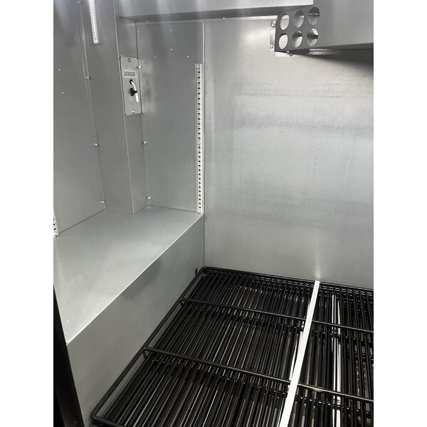 Scratch and Dent True TBB-4-HC 90 3/8" Black Counter Height Solid Door Back Bar Refrigerator with LED Lighting