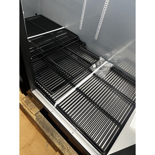 Scratch and Dent True TBB-4-HC 90 3/8" Black Counter Height Solid Door Back Bar Refrigerator with LED Lighting