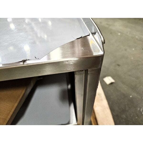 Scratch and Dent Regency 21" x 33" Three Shelf 18-Gauge 304 Stainless Steel Utility Cart with Enclosed Base and Open Front