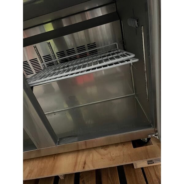 Scratch and Dent Avantco SS-WT-48F-HC Two Door Worktop Freezer with 3 1/2" Backsplash