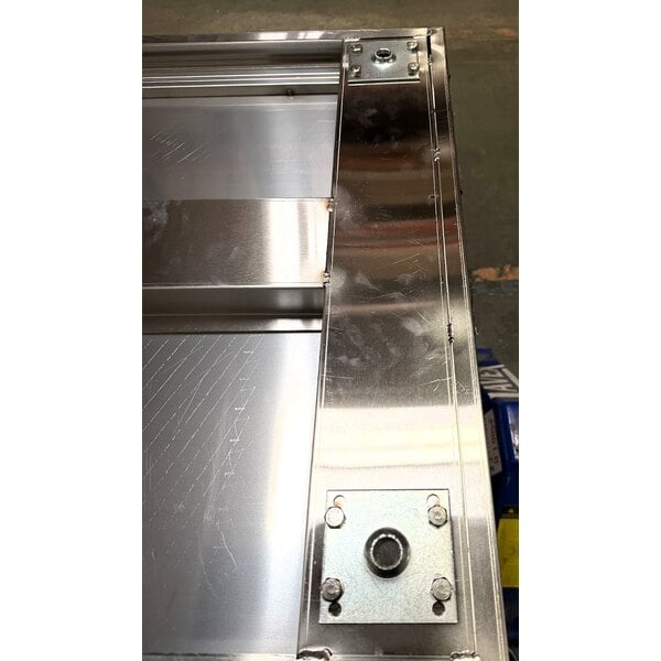 Scratch and Dent Regency 30" x 48" 16 Gauge Type 304 Stainless Steel Enclosed Base Table with Sliding Doors and Adjustable Midshelf