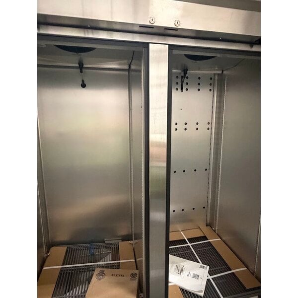 Scratch and Dent True T-49DT-HC 54 1/8" Bottom Mounted Solid Door Reach-In Combination Refrigerator / Freezer
