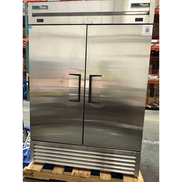 Scratch and Dent True T-49DT-HC 54 1/8" Bottom Mounted Solid Door Reach-In Combination Refrigerator / Freezer