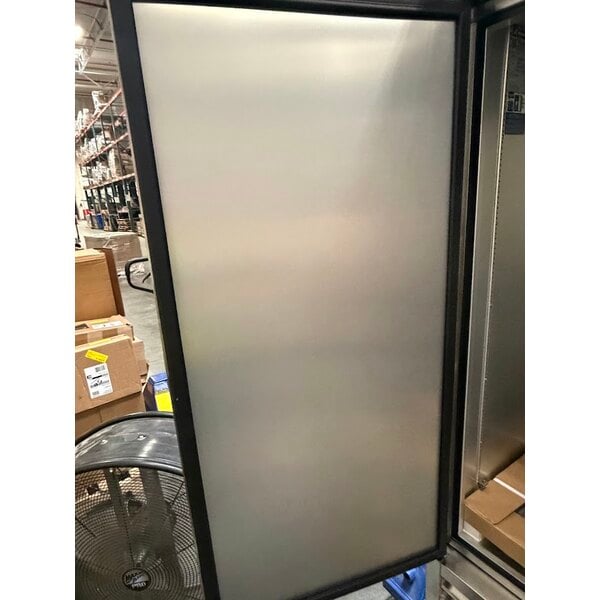Scratch and Dent True T-49DT-HC 54 1/8" Bottom Mounted Solid Door Reach-In Combination Refrigerator / Freezer