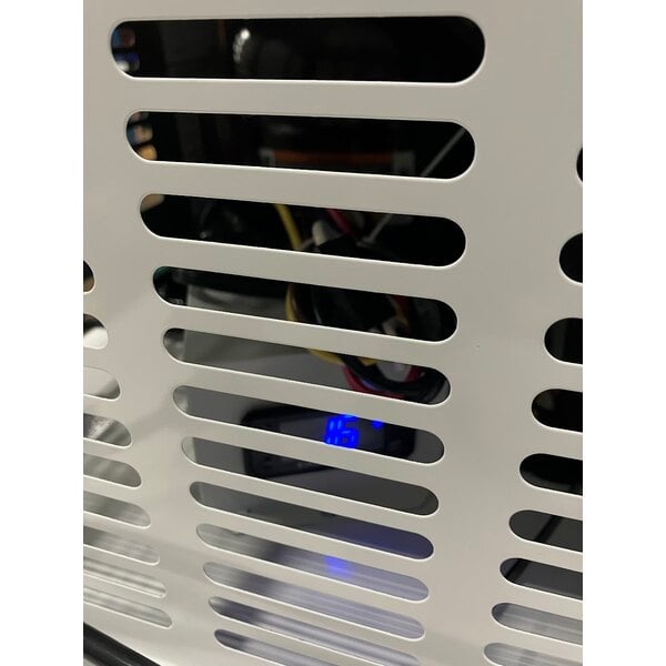 Scratch and Dent Leer 40ASL-R290 51" Outdoor Auto Defrost Ice Merchandiser with Slanted Front and Galvanized Steel Door