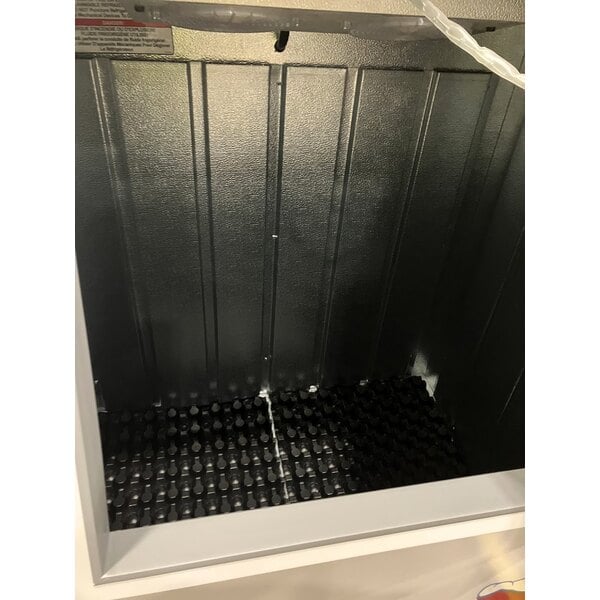 Scratch and Dent Leer 40ASL-R290 51" Outdoor Auto Defrost Ice Merchandiser with Slanted Front and Galvanized Steel Door