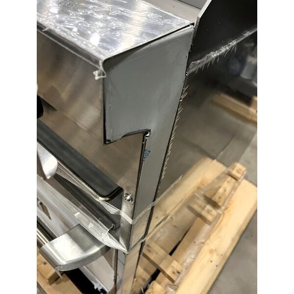 Scratch and Dent Garland G60-6R24CR Natural Gas 6 Burner 60" Range with 24" Raised Griddle / Broiler, 1 Standard Oven, and 1 Convection Oven - 307,000 BTU
