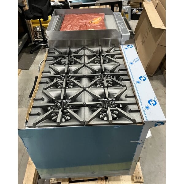Scratch and Dent Garland G60-6R24CR Natural Gas 6 Burner 60" Range with 24" Raised Griddle / Broiler, 1 Standard Oven, and 1 Convection Oven - 307,000 BTU