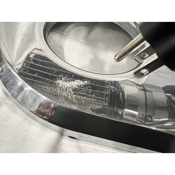 Scratch and Dent Estella CG112NB 3.3 lb. Per Minute Electric Hard Cheese Grater - 110V, 1 1/2 hp
