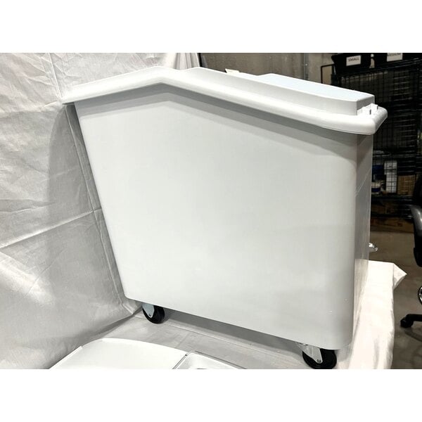 Scratch and Dent Rubbermaid® FG360388WHT ProSave 30.8 Gallon / 490 Cup White Slant Top Mobile Ingredient Storage Bin with Sliding Lid & Scoop