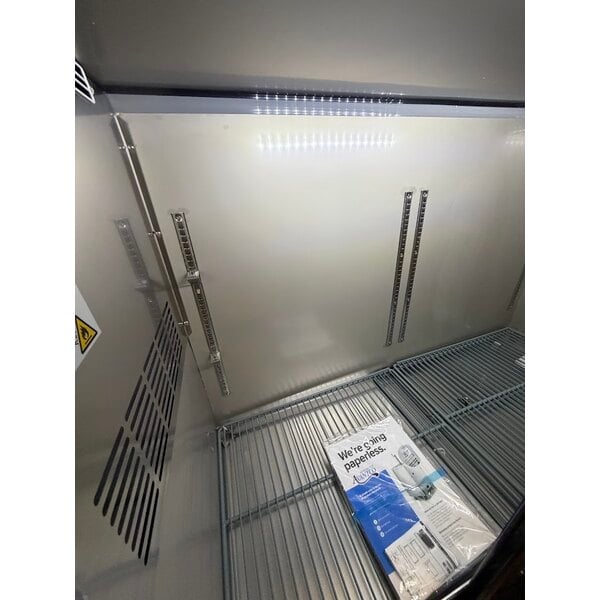 Scratch and Dent Avantco UBB-60S-HC 60" Stainless Steel Counter Height Narrow Sliding Glass Door Back Bar Refrigerator with LED Lighting
