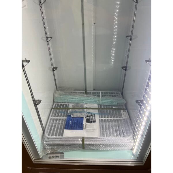 Scratch and Dent Avantco GDC-12F-HC 27" White Swing Glass Door Merchandiser Freezer with LED Lighting