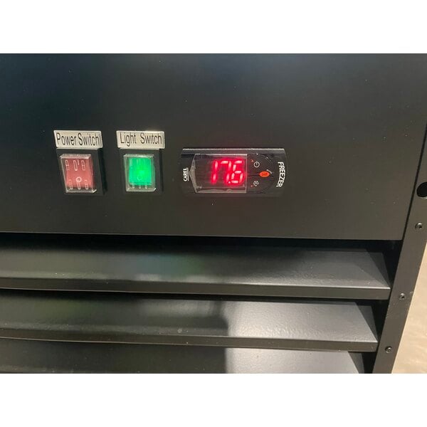 Scratch and Dent Avantco GD-ICE-49F 53" Black Indoor Glass Door Ice Merchandiser