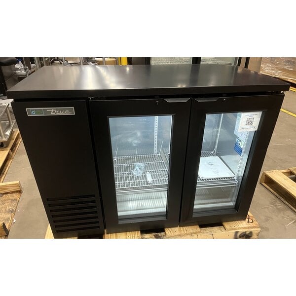Scratch and Dent True TBB24-48-2G-Z1-BST-B-1 48 1/8" Black Underbar Glass Door Narrow Back Bar Refrigerator with Black Underbar Sub Top and LED Lighting