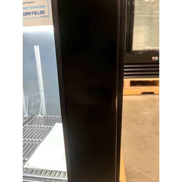 Scratch and Dent True TBB24-48-2G-Z1-BST-B-1 48 1/8" Black Underbar Glass Door Narrow Back Bar Refrigerator with Black Underbar Sub Top and LED Lighting