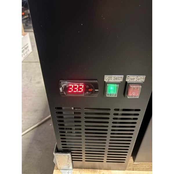 Scratch and Dent Avantco UBB-72-HC 73" Black Counter Height Narrow Solid Door Back Bar Refrigerator with LED Lighting