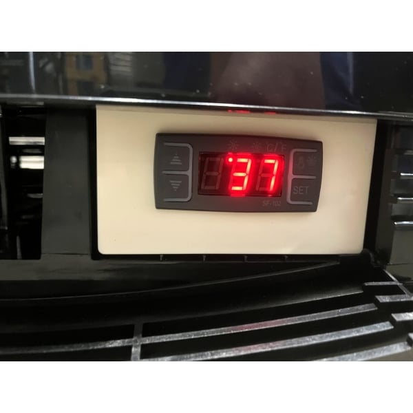 Scratch and Dent Avantco GSM-3-2-HC Black Glass Sided Pass-Through Countertop Display Refrigerator