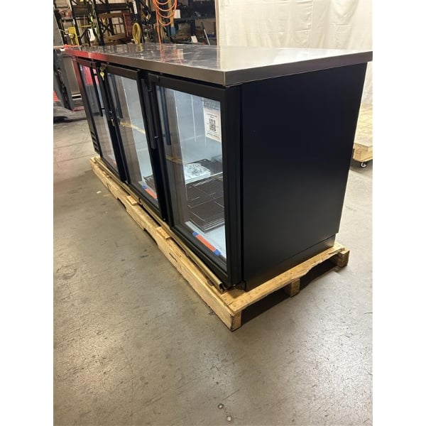 Scratch and Dent True TBB-4G-HC-LD 90 3/8" Black Counter Height Glass Door Back Bar Refrigerator with LED Lighting