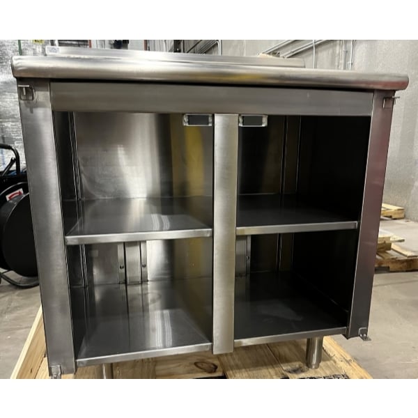 Scratch and Dent Advance Tabco HK-SS-243M 24" x 36" 14 Gauge Enclosed Base Stainless Steel Work Table with Fixed Midshelf and 5" Backsplash