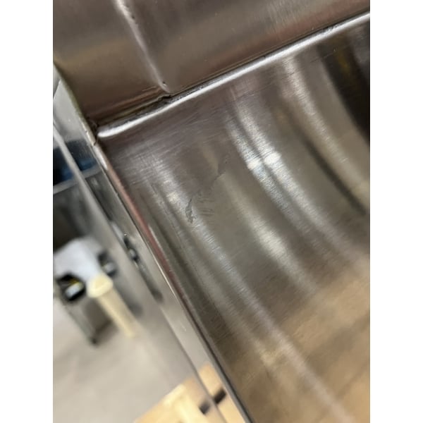 Scratch and Dent Advance Tabco HK-SS-243M 24" x 36" 14 Gauge Enclosed Base Stainless Steel Work Table with Fixed Midshelf and 5" Backsplash