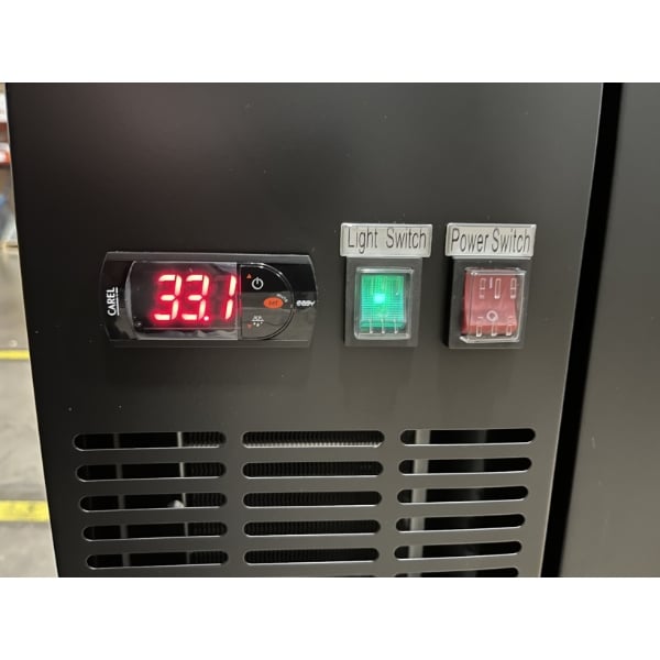 Scratch and Dent Avantco UBB-72-HC 73" Black Counter Height Narrow Solid Door Back Bar Refrigerator with LED Lighting