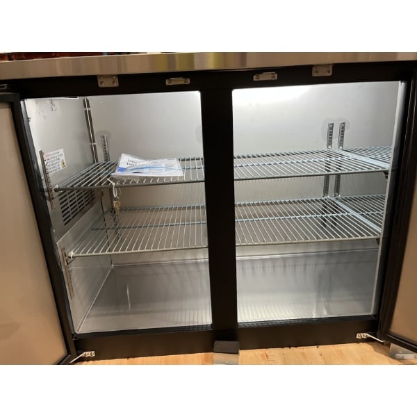 Scratch and Dent Avantco UBB-72-HC 73" Black Counter Height Narrow Solid Door Back Bar Refrigerator with LED Lighting