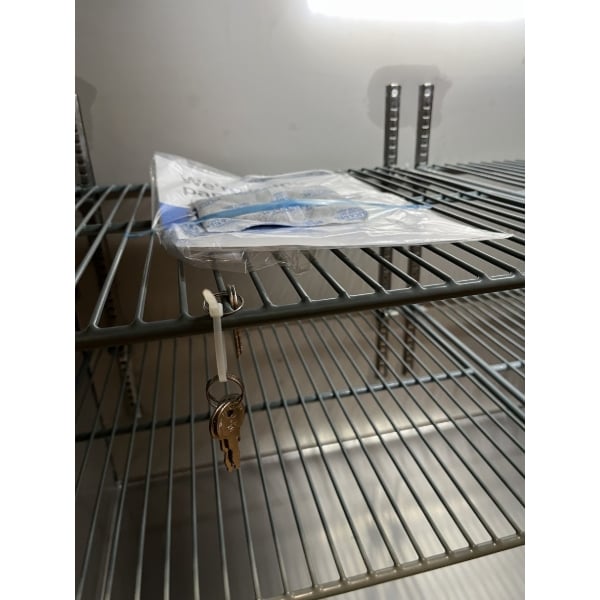 Scratch and Dent Avantco UBB-72-HC 73" Black Counter Height Narrow Solid Door Back Bar Refrigerator with LED Lighting
