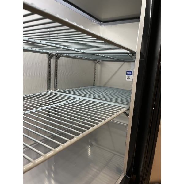 Scratch and Dent Avantco UBB-72-HC 73" Black Counter Height Narrow Solid Door Back Bar Refrigerator with LED Lighting