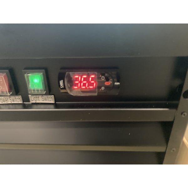 Scratch and Dent Avantco GDC-69-HC 78 1/4" Black Swing Glass Door Merchandiser Refrigerator with LED Lighting