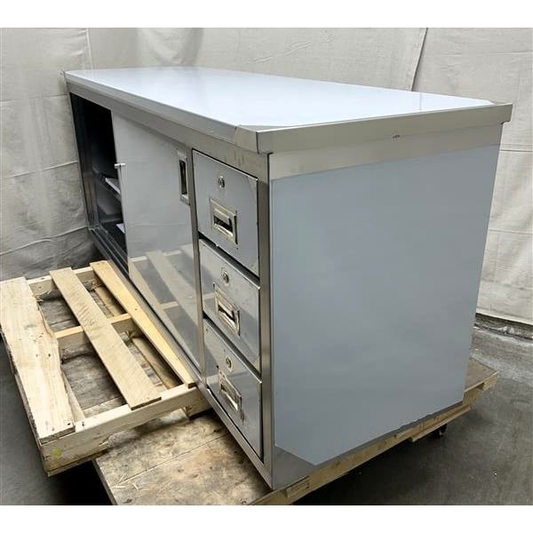 Scratch and Dent Regency 24" x 72" 16 Gauge Type 304 Stainless Steel Enclosed Base Sliding Door Table with Drawers