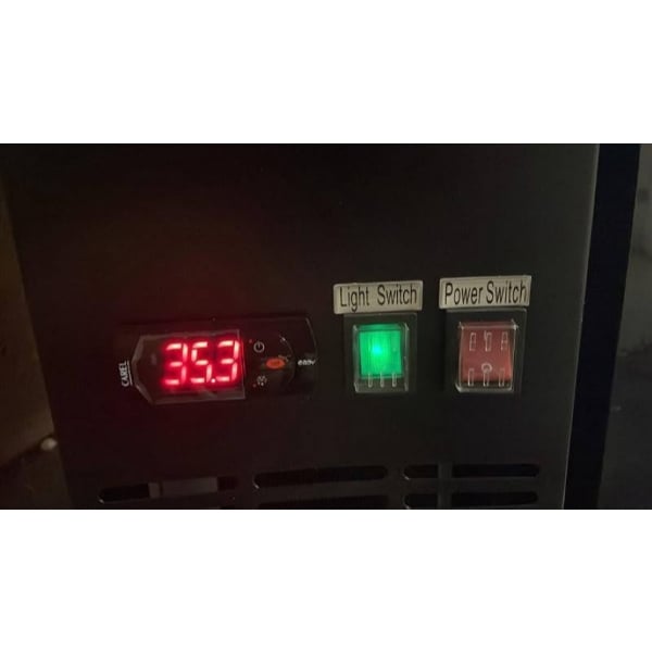 Scratch and Dent Avantco UBB-72S-HC 73" Black Counter Height Narrow Sliding Glass Door Back Bar Refrigerator with LED Lighting