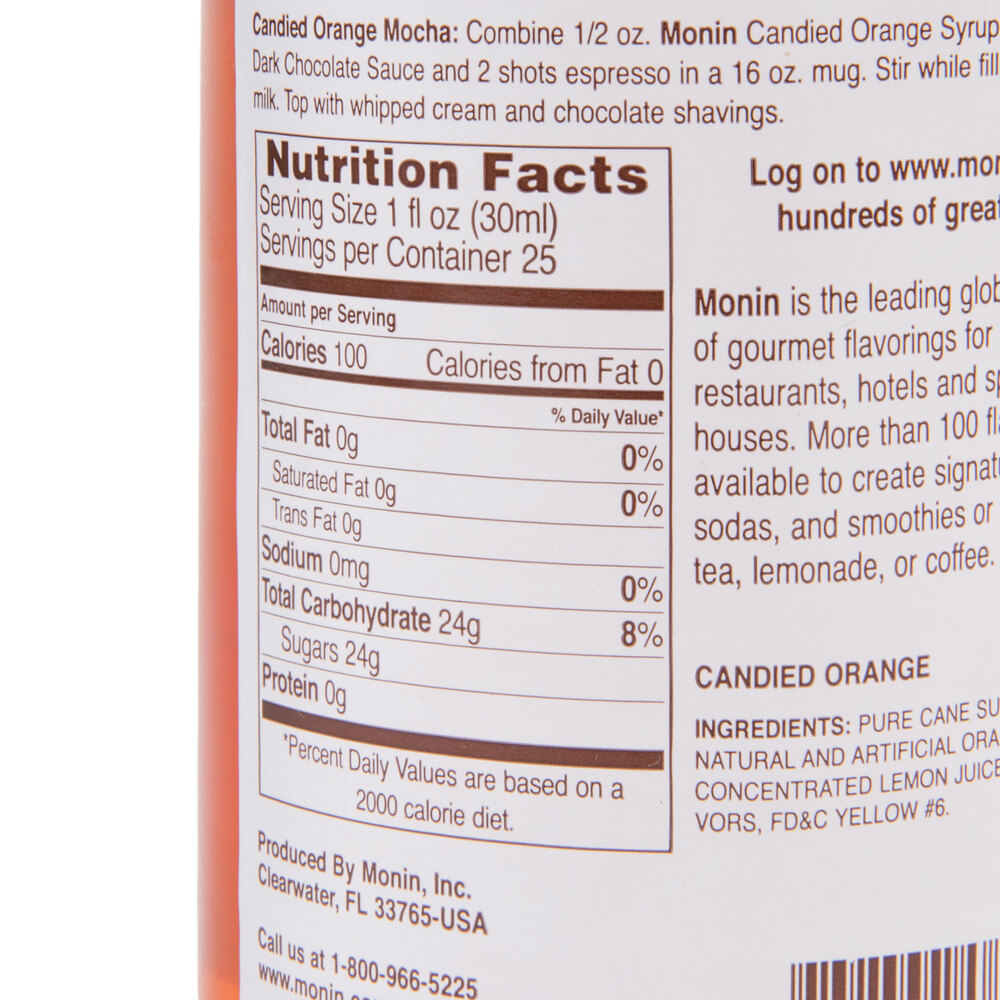 Monin 750 mL Premium Candied Orange Flavoring / Fruit Syrup