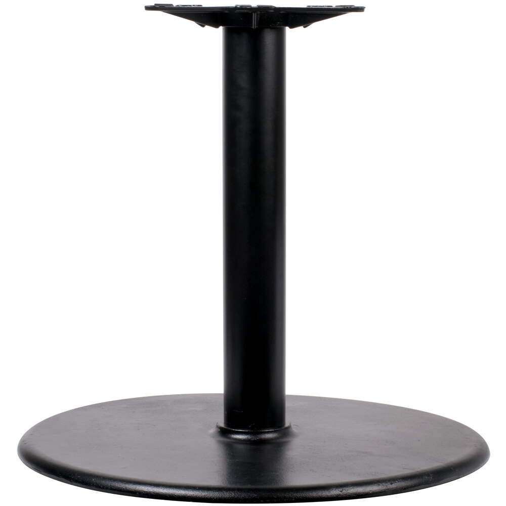Black steel column on top of round base plate
