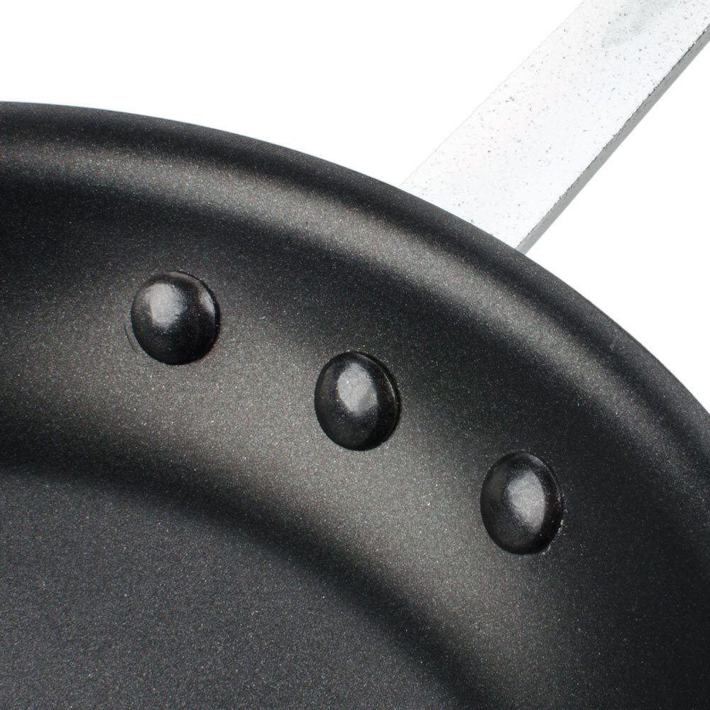 Riveted handle on a fry pan