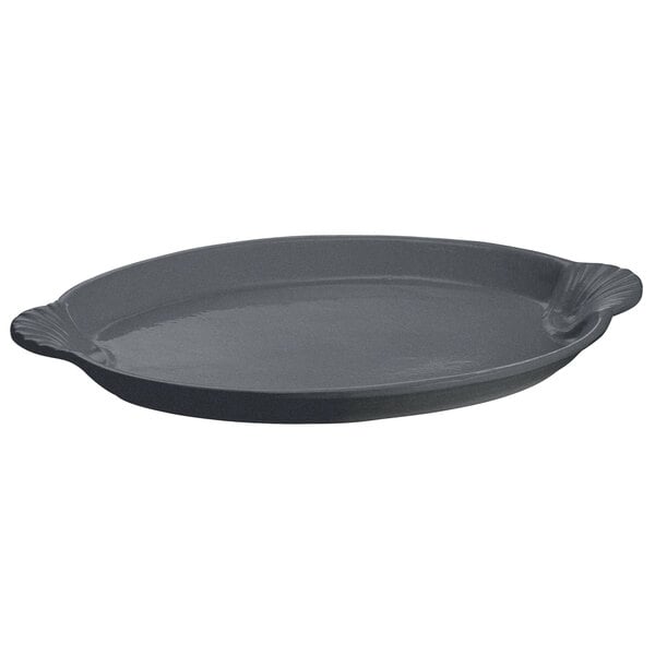 A gray oval Tablecraft granite cast aluminum platter with a shell design and handles.