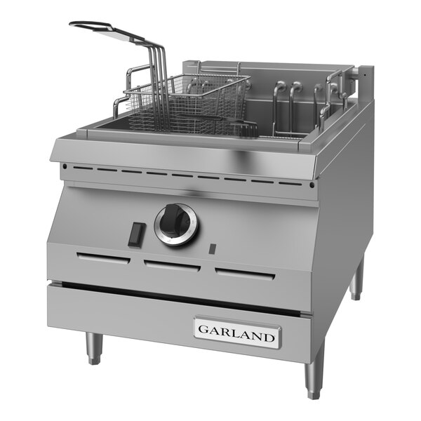 A stainless steel electric countertop deep fryer with dual fryer baskets and control knob, designed for commercial kitchen use.