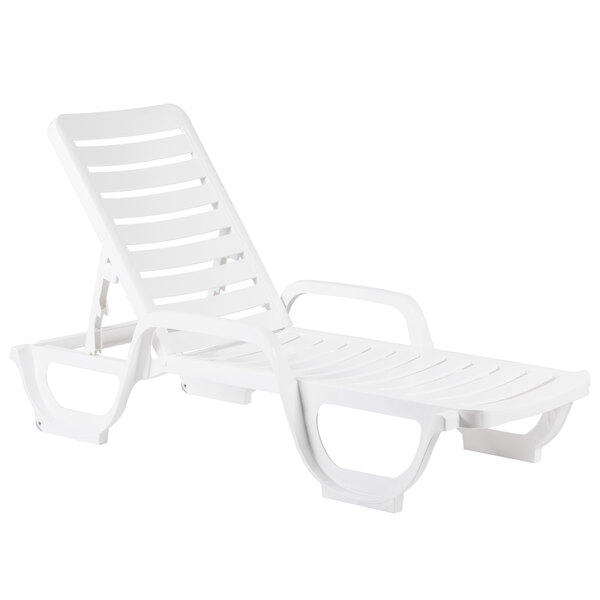 A case of 18 white Grosfillex plastic chaise lounge chairs with armrests.