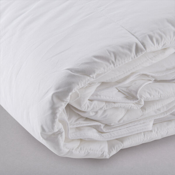 An Oxford white duvet insert on a white surface.
