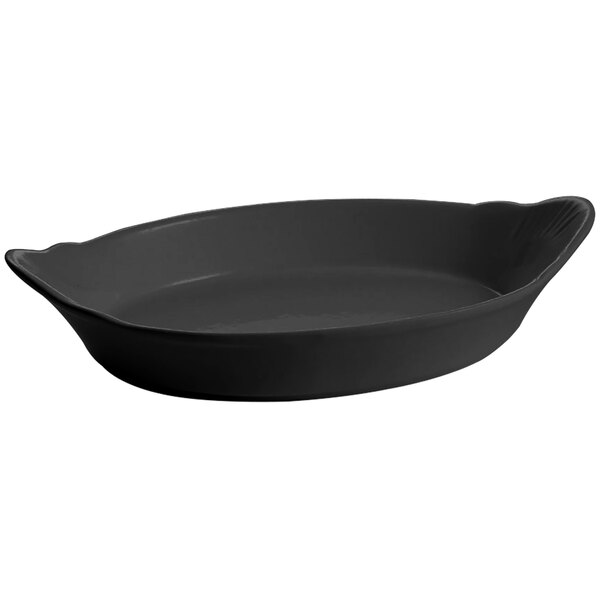 A black Tablecraft oval au gratin dish.