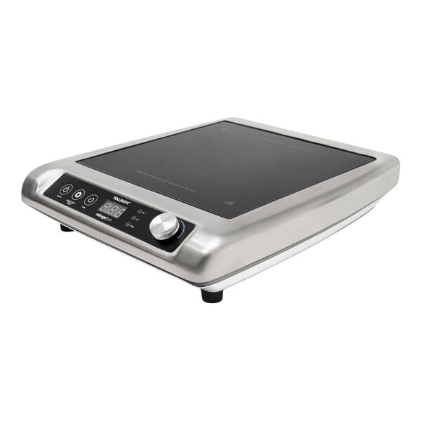 A stainless steel countertop induction range with a digital display and control knob.