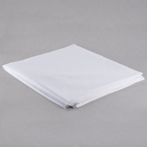 A folded white cloth with a white background.