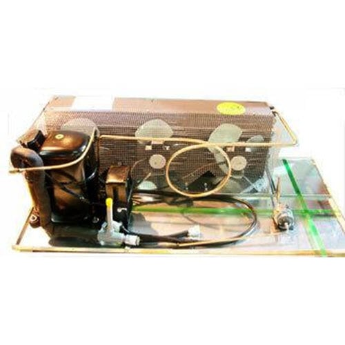 A True condensing unit on a glass table.