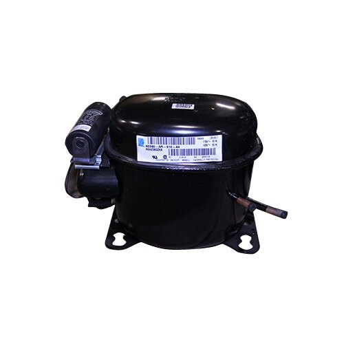 A black True refrigeration compressor with a small motor and white label.