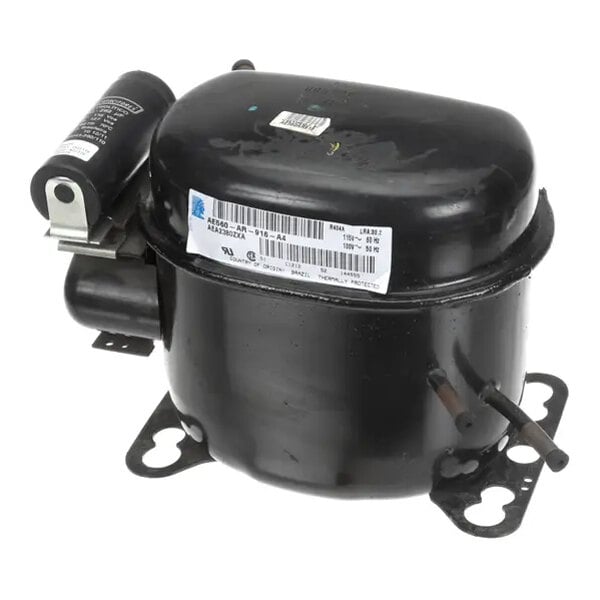 A black, cylindrical refrigeration compressor unit with attached relay and start capacitor, featuring mounting brackets and a visible product label.
