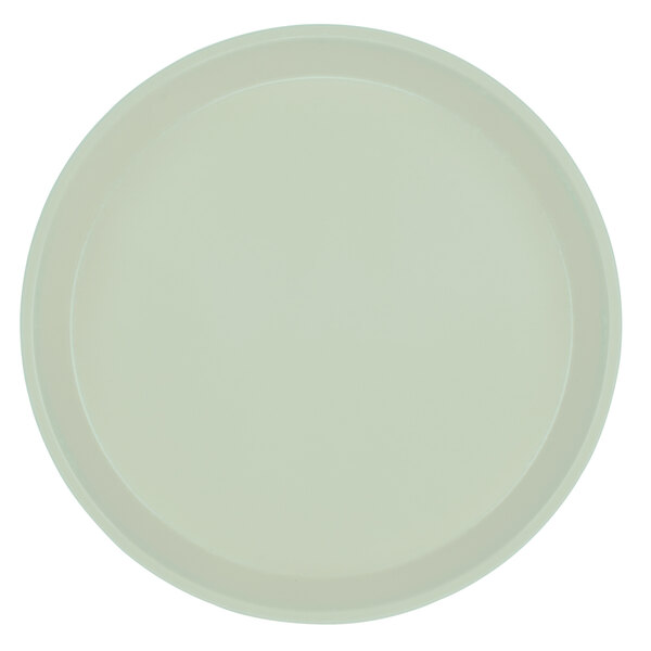 A white round Cambro cafeteria tray with a round rim.