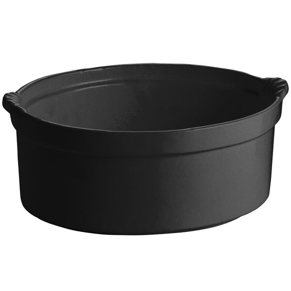 A black round pot with a handle.