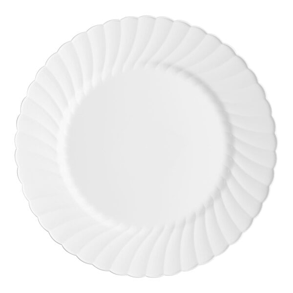 A white WNA Comet Classicware plastic plate with a wavy pattern.